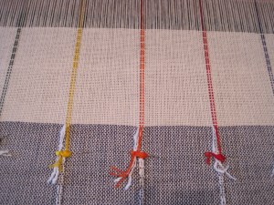 transition of decorative threads, anchored with pins